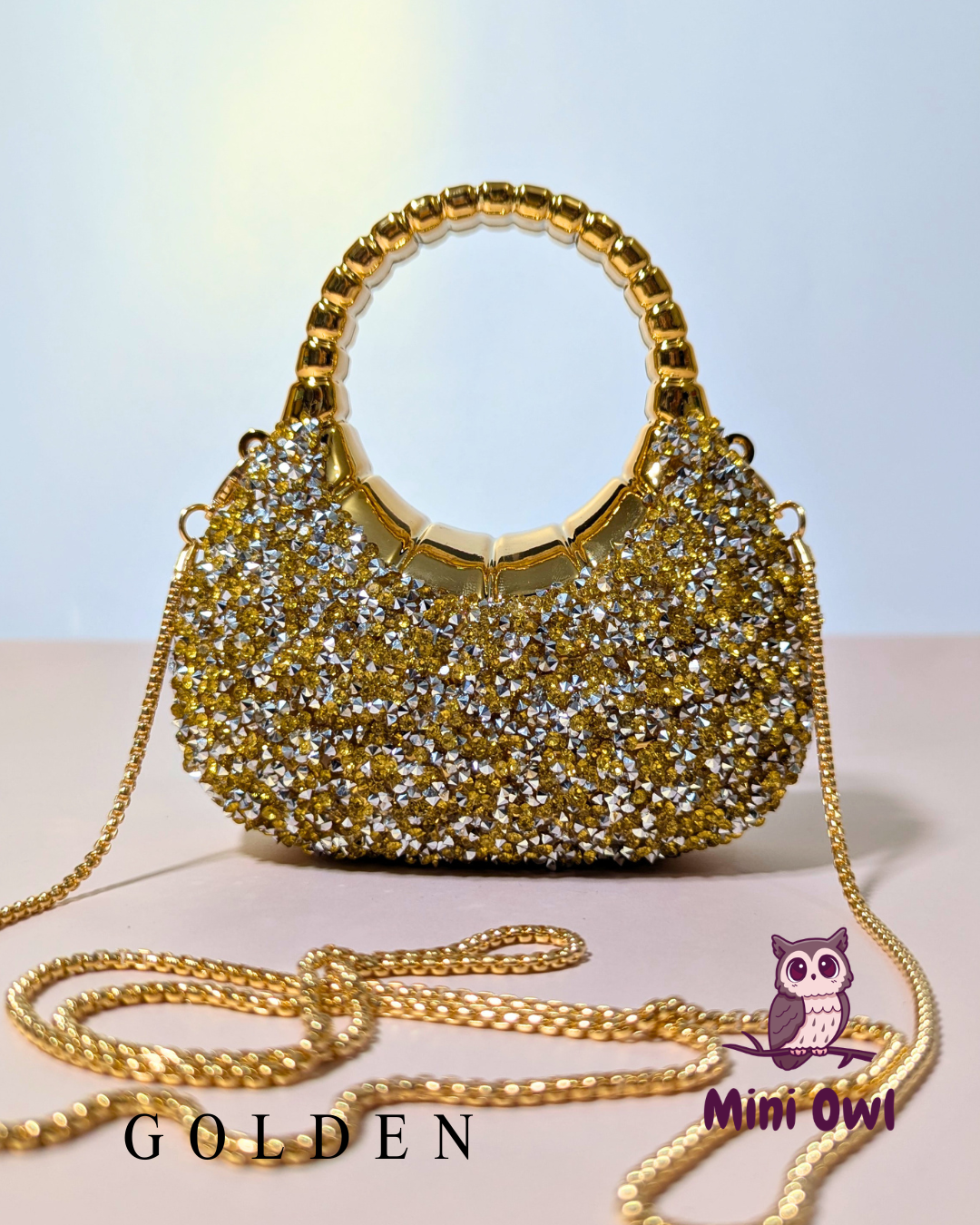 Rhinestone-encrusted acrylic mini clutch